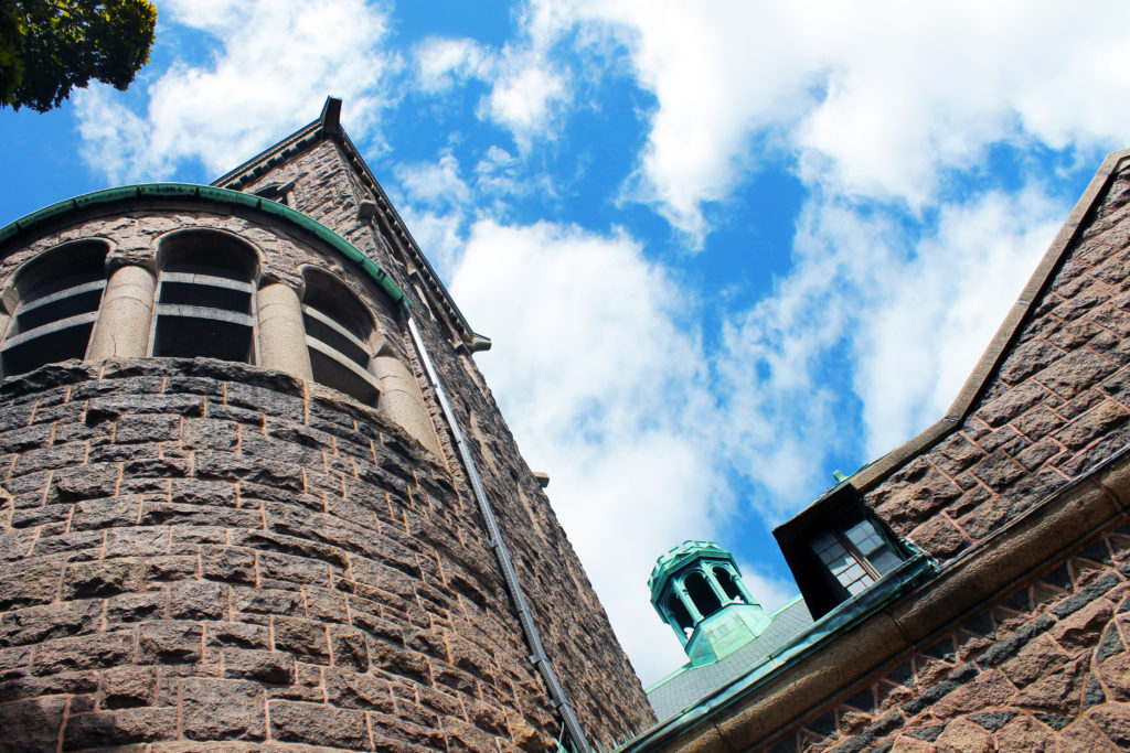 A view of the top of an old brick building.