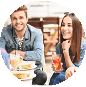 A group of people sitting around a table.