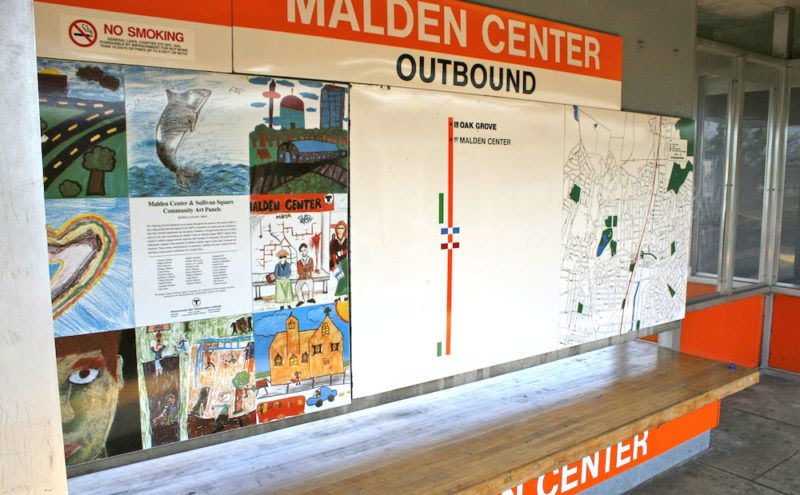 A wall with several different types of information on it.