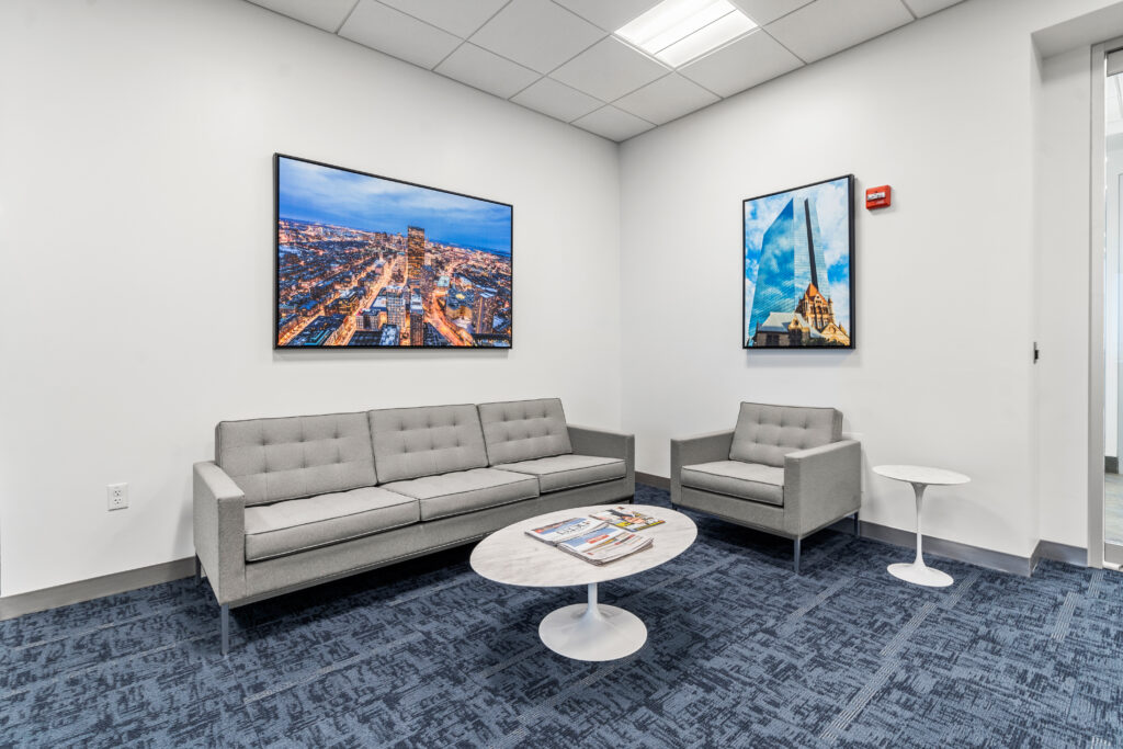 A room with two couches and a table