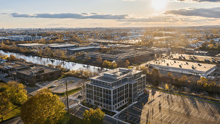 A view of the city from above at sunset.